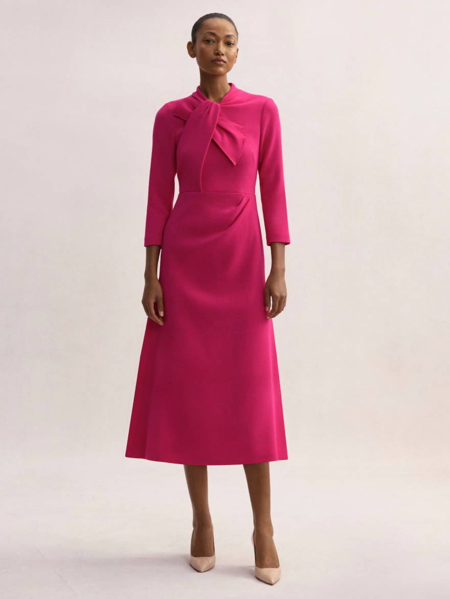 Model wearing fuchsia pink Nola dress